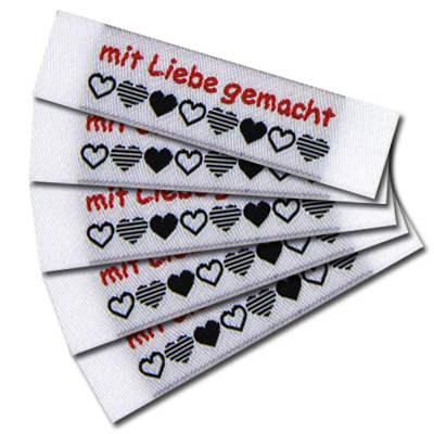 Étiquette textile „mit Liebe gemacht“